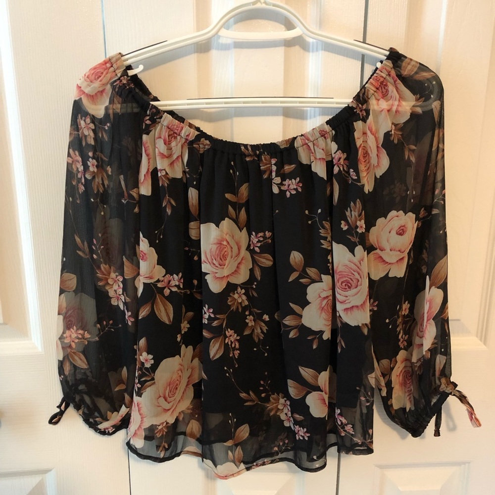 Off the shoulder flower shirt.